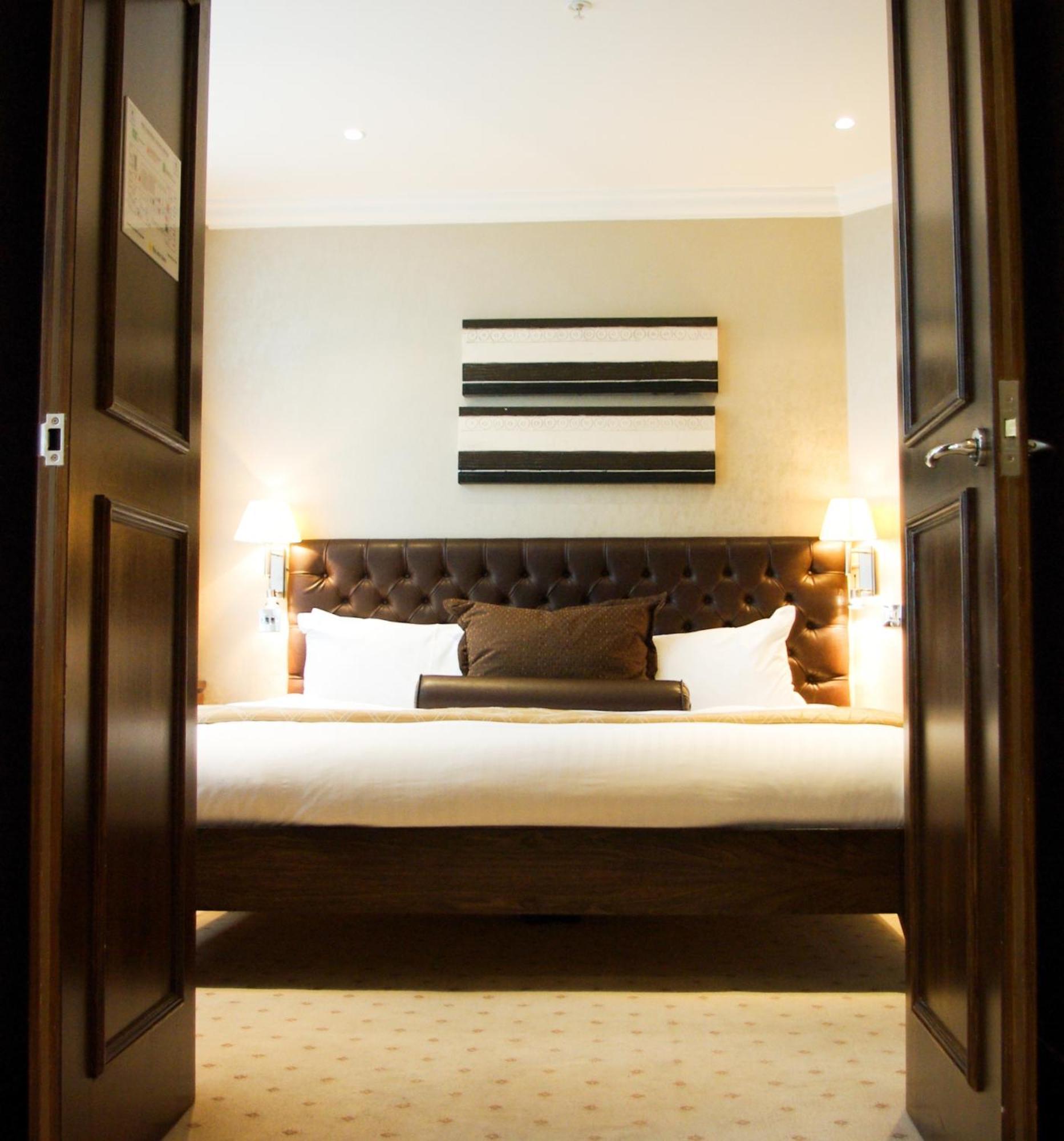 Courthouse Hotel London Bagian luar foto A bedroom at the hotel