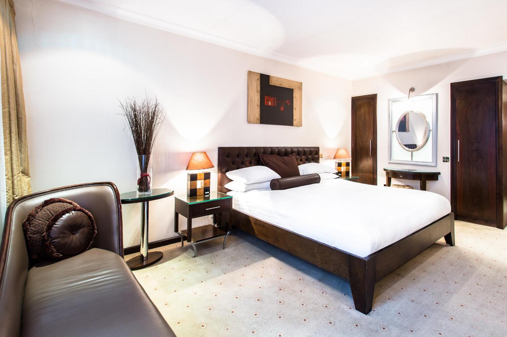 Courthouse Hotel London Ruang foto A bedroom at the hotel
